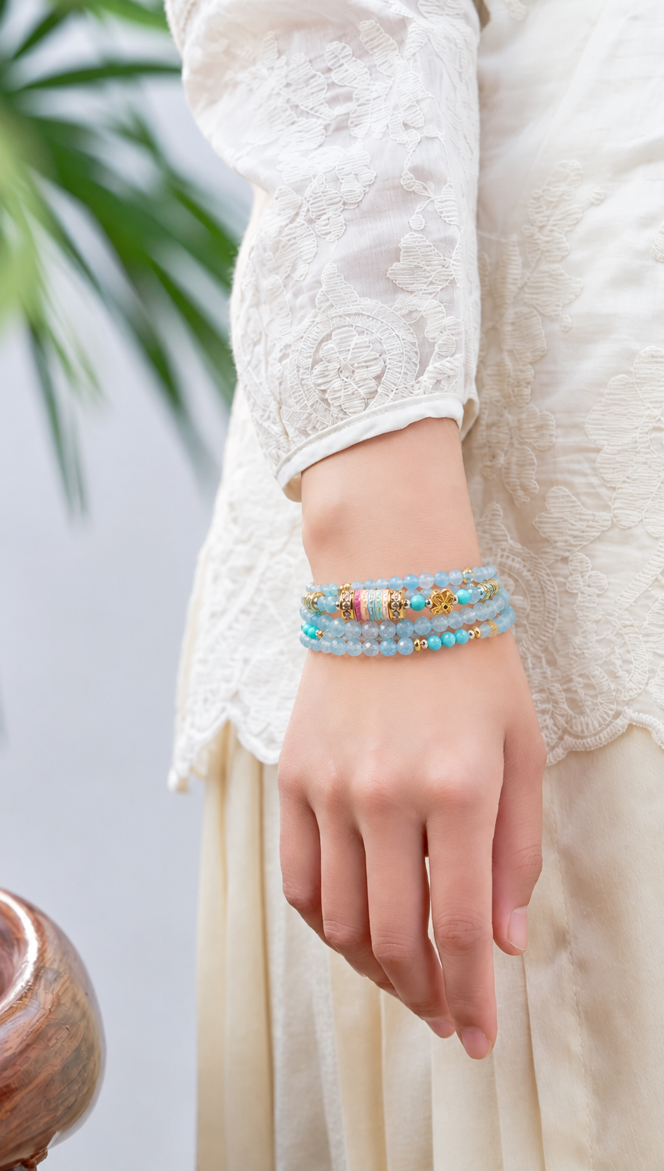 Cancer aquamarine zodiac bracelet worn on a model wrist