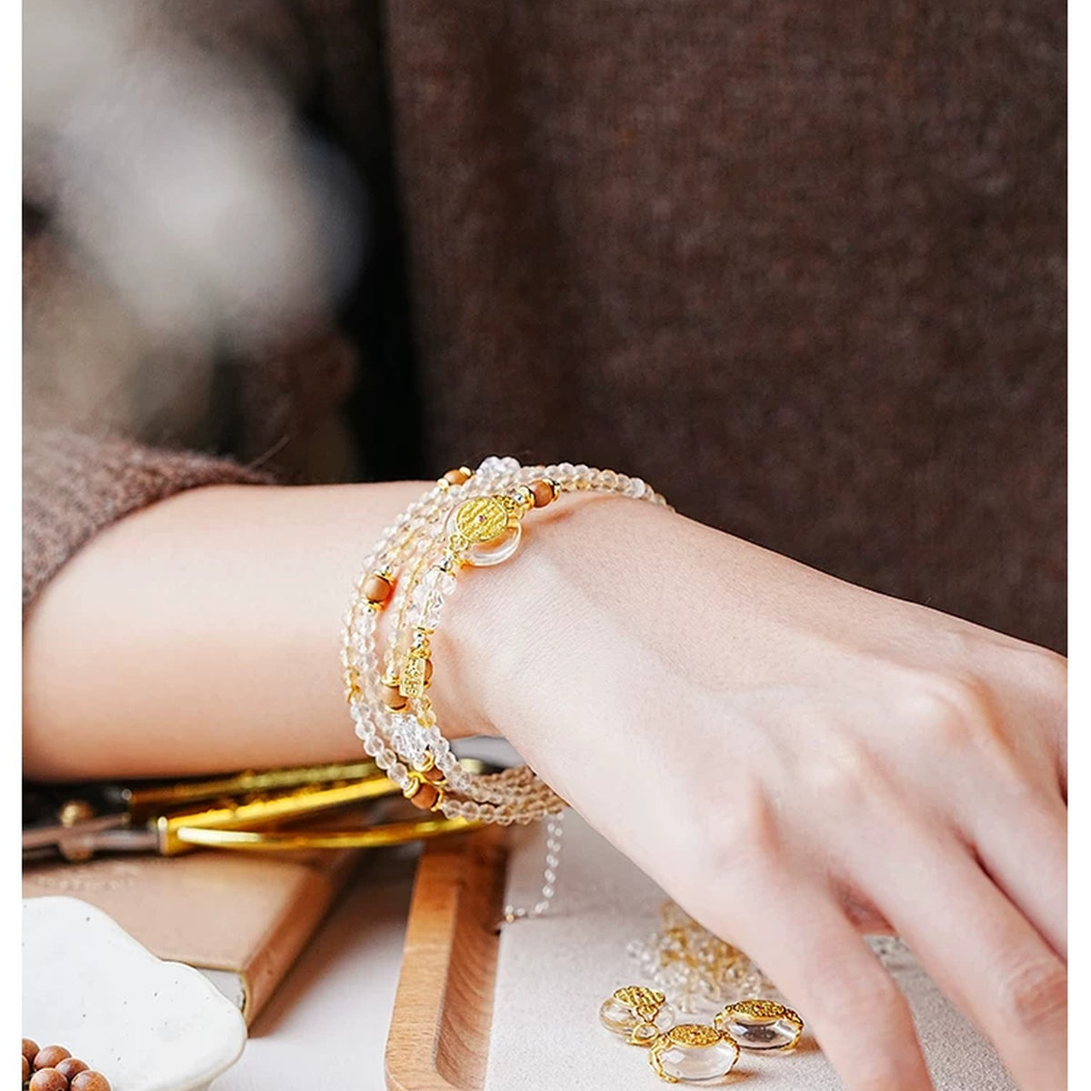 Model wearing the Taurus Citrine multi-wrap bracelet