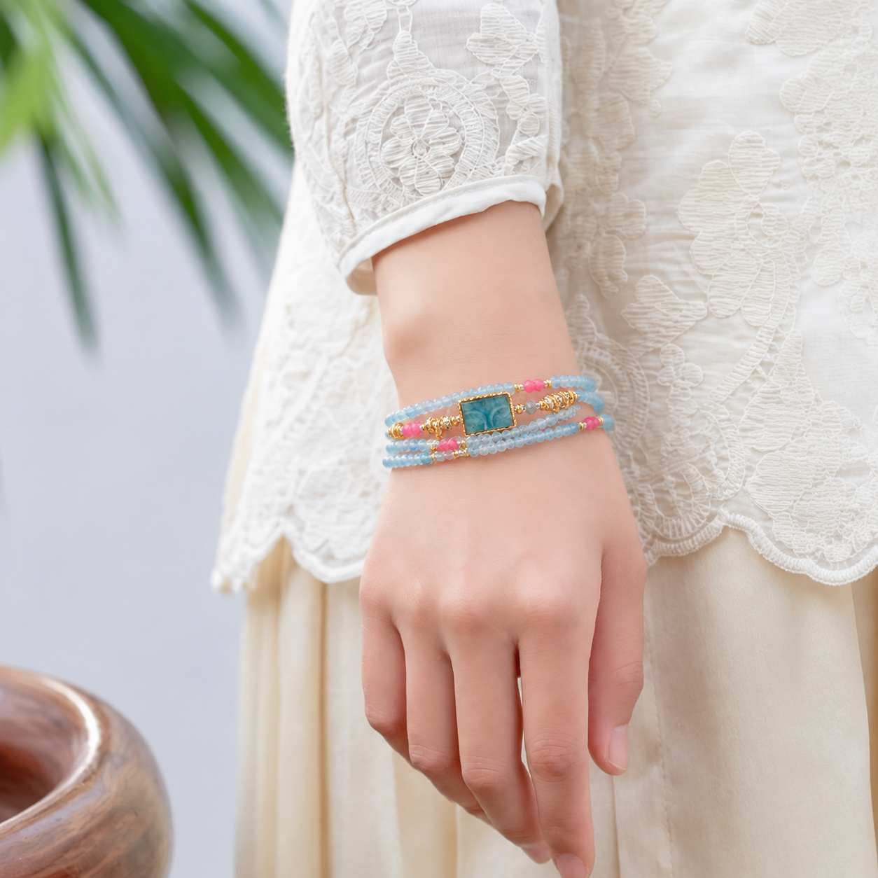 Scorpio aquamarine zodiac bracelet worn on a model wrist