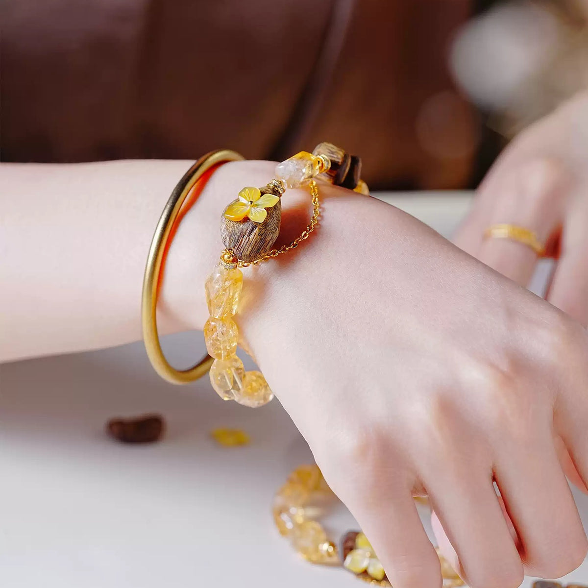 Close-up of the Tingchao bracelet worn on the wrist