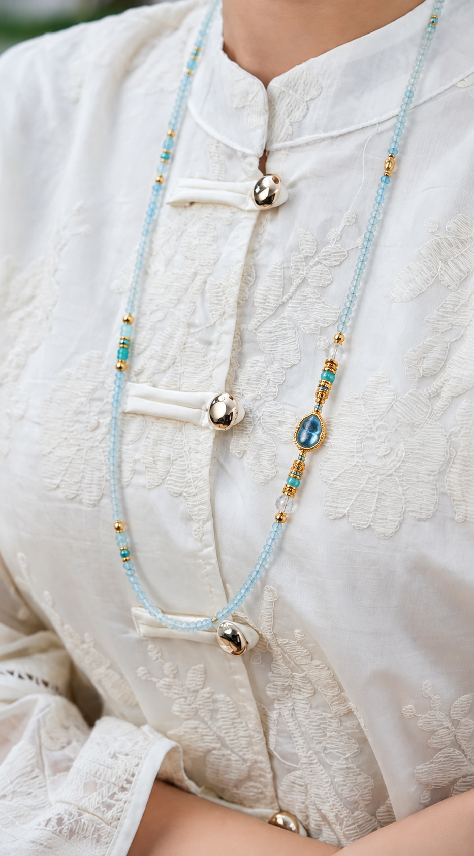 Gemini aquamarine convertible necklace worn by a model