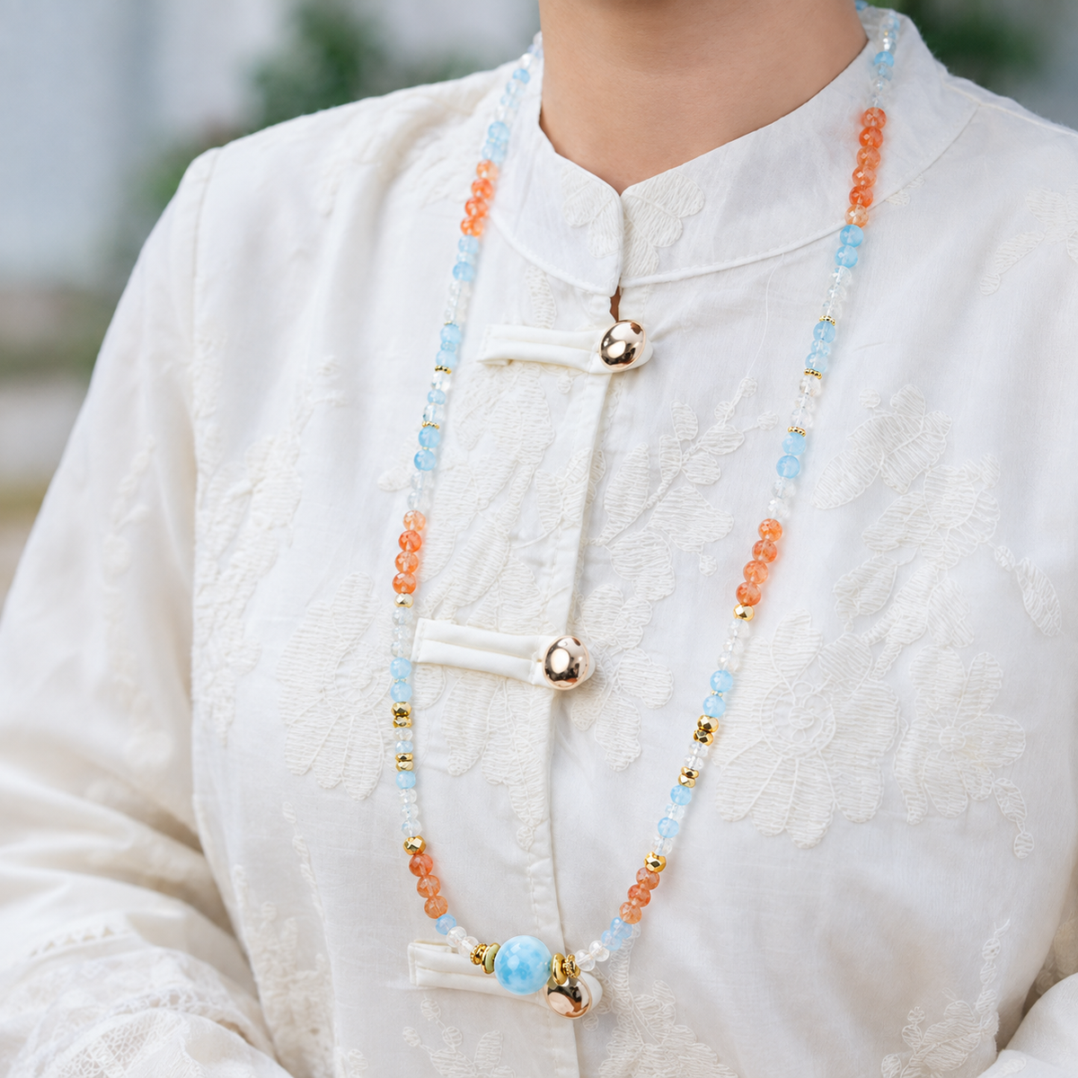 Pisces aquamarine convertible necklace worn by a model