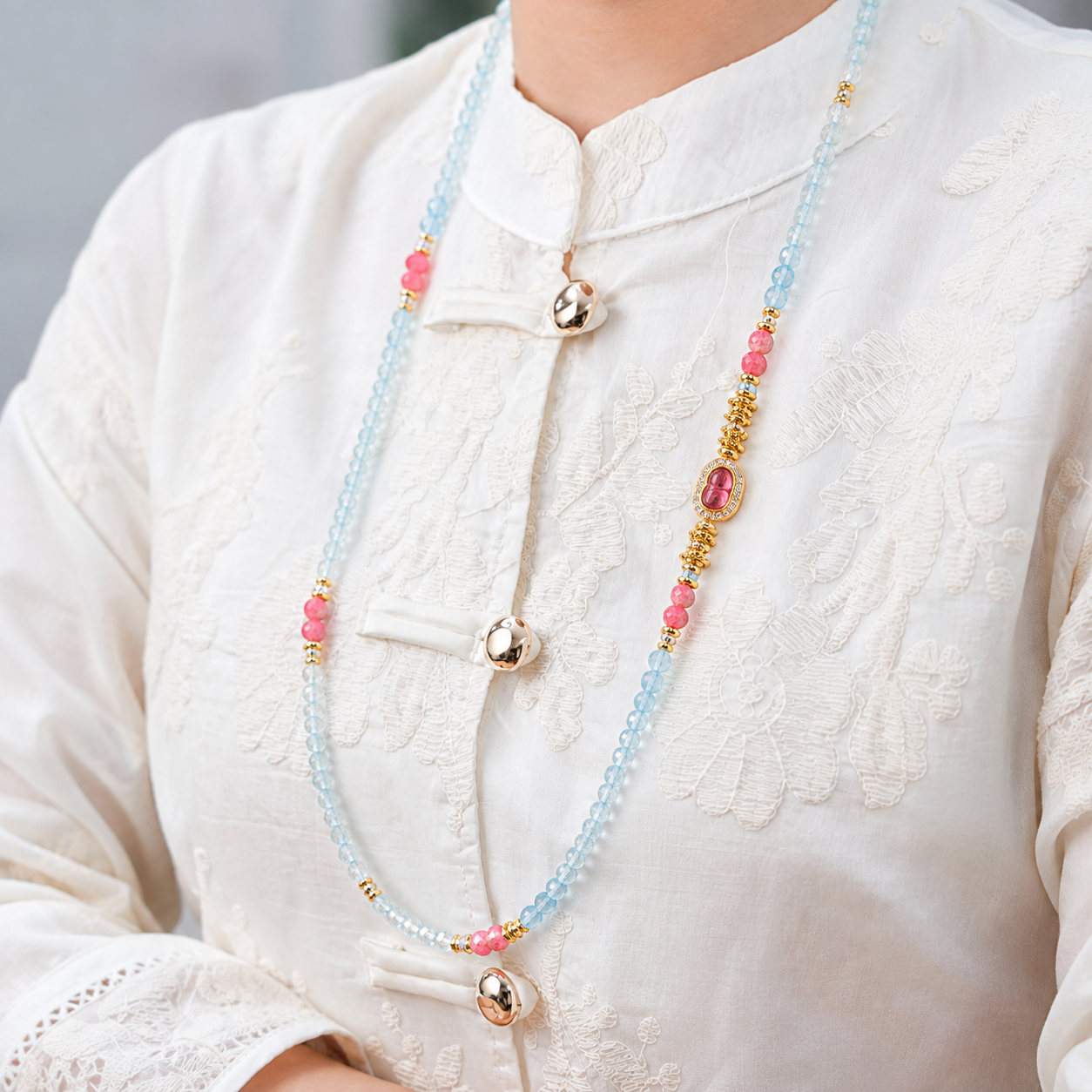 Virgo aquamarine convertible necklace worn by a model