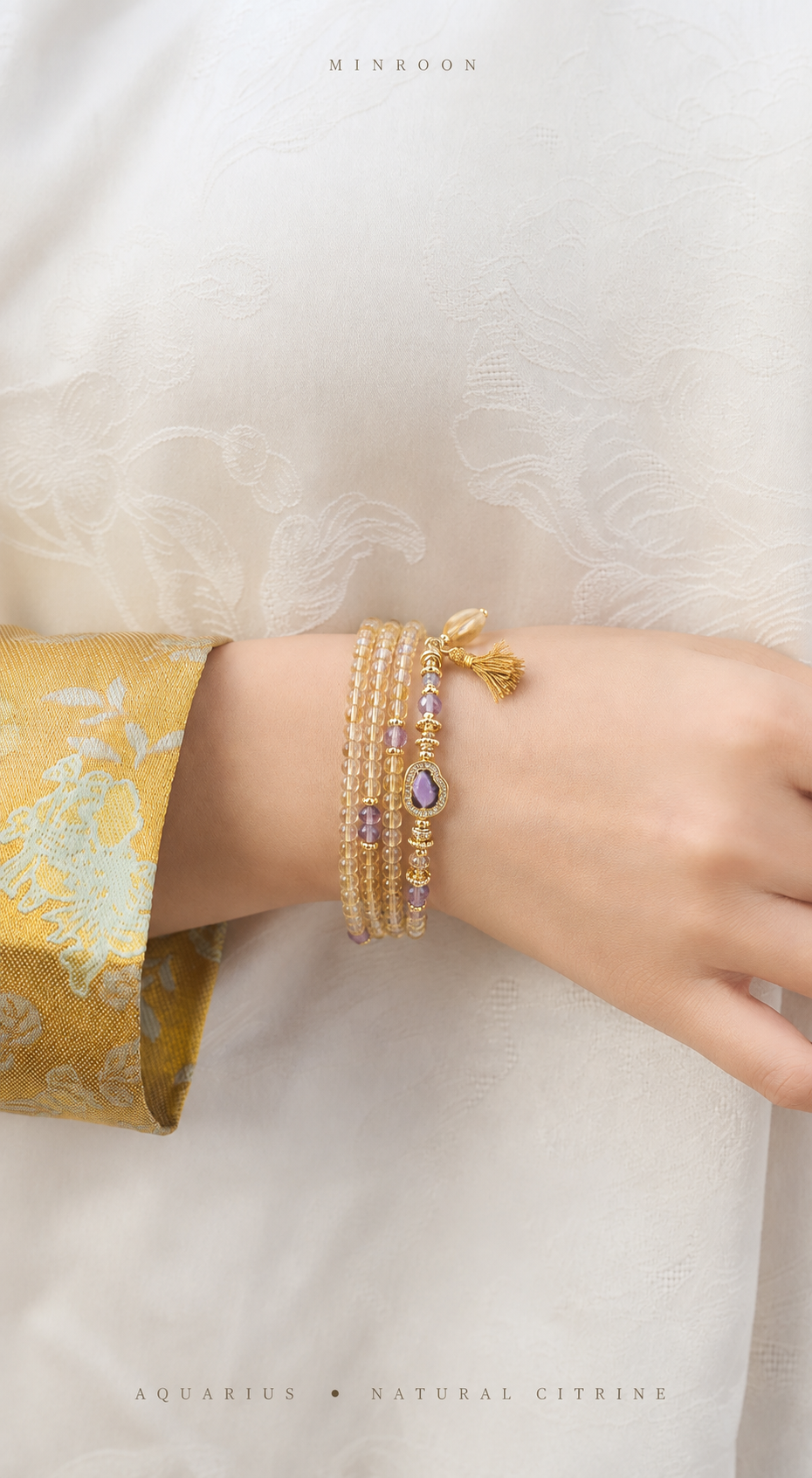 Aquarius natural citrine and amethyst bracelet worn on a model wrist