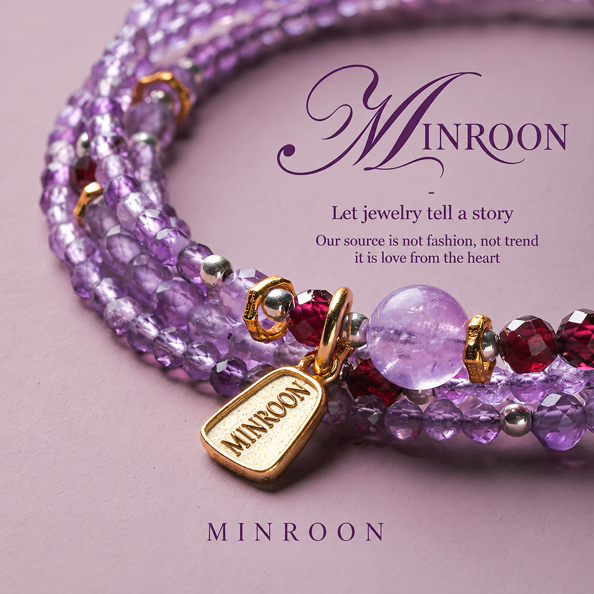 Close-up of faceted amethyst, garnet accents and MINROON charm