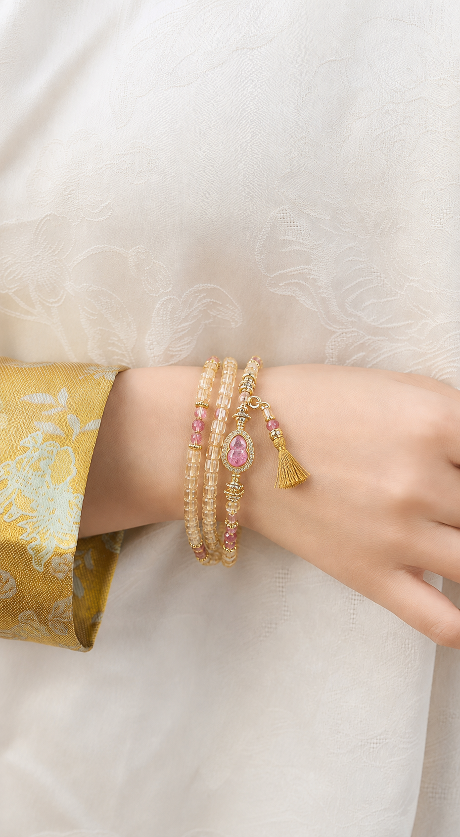Virgo natural citrine and pink tourmaline bracelet worn on a model wrist