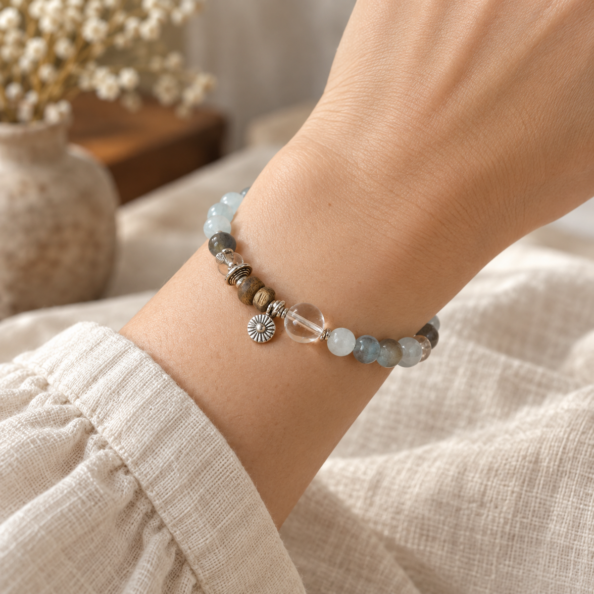 Flow aquamarine and agarwood bracelet worn on wrist