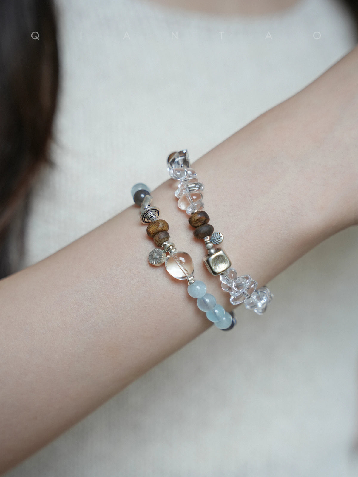 Flow aquamarine and agarwood bracelet styled on the wrist in soft daylight