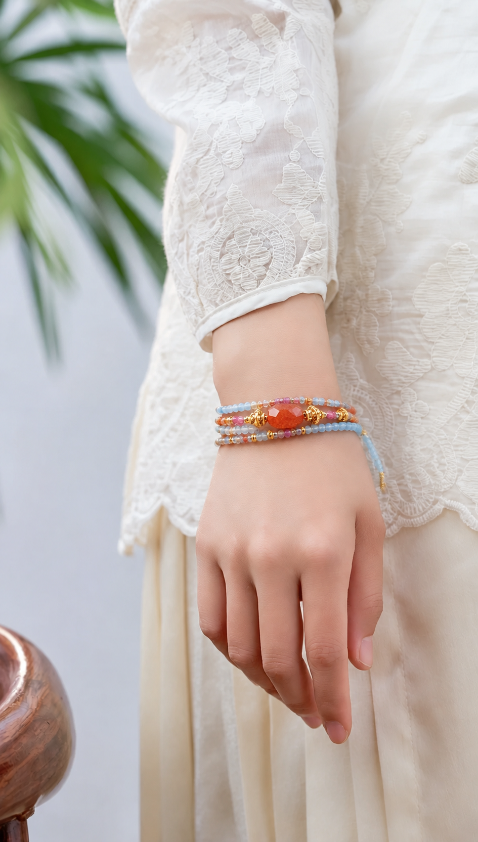 Leo aquamarine zodiac bracelet worn on a model wrist