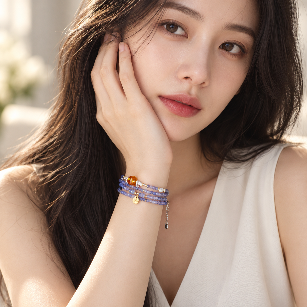 Close model detail wearing the Cancer crystal wrap bracelet