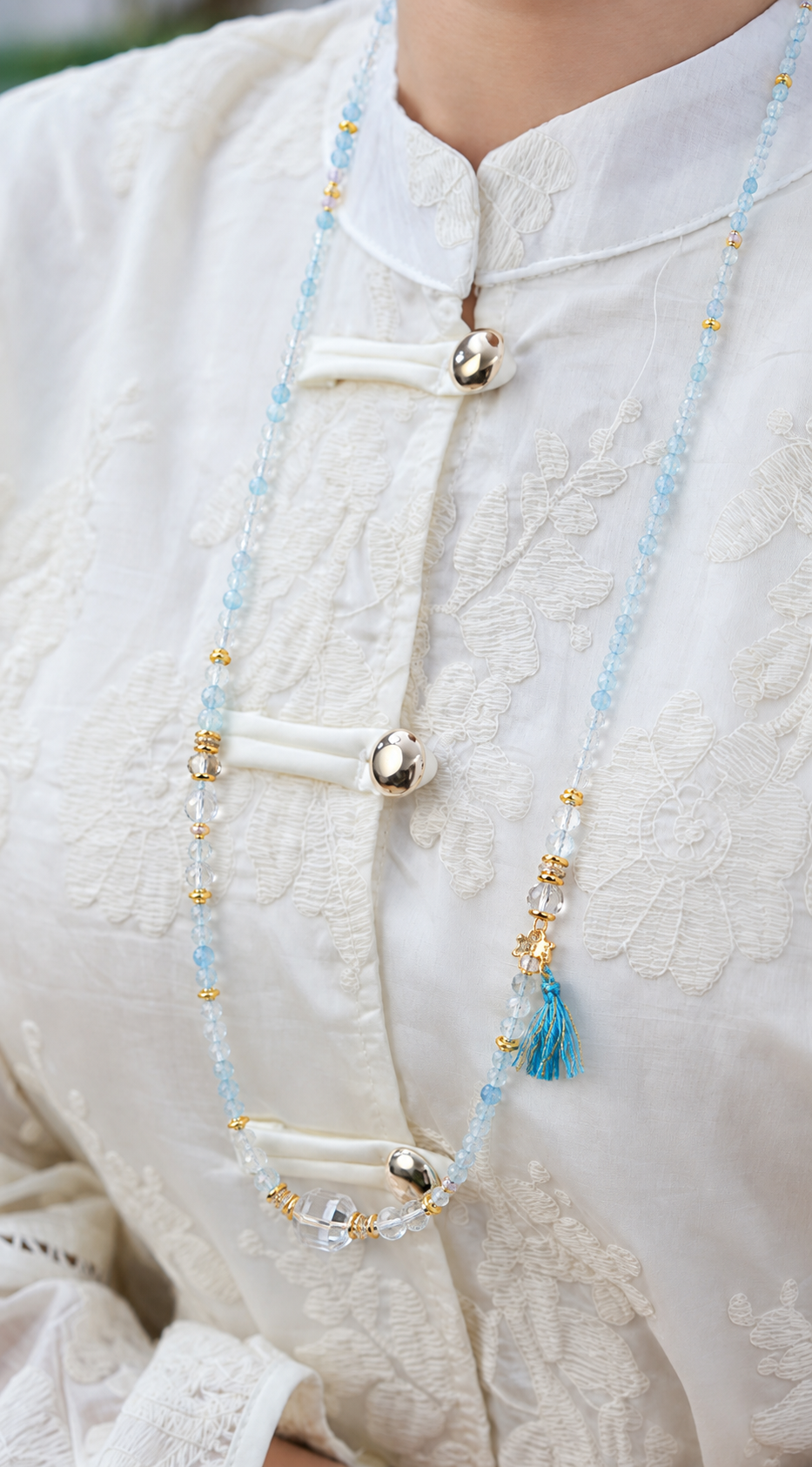 Aries aquamarine convertible necklace worn by a model