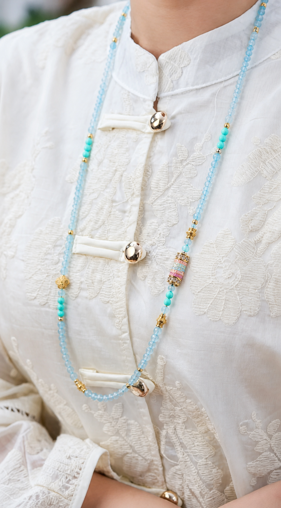 Cancer aquamarine convertible necklace worn by a model