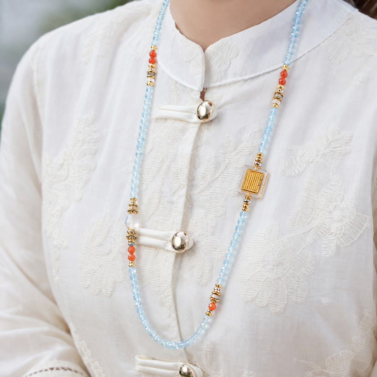 Capricorn aquamarine convertible necklace worn by a model