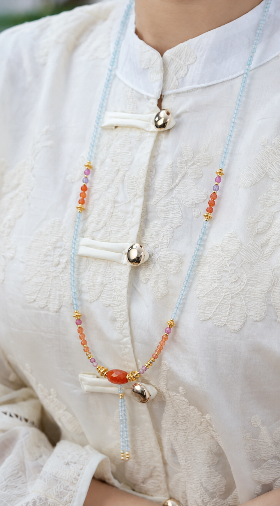 Leo aquamarine convertible necklace worn by a model