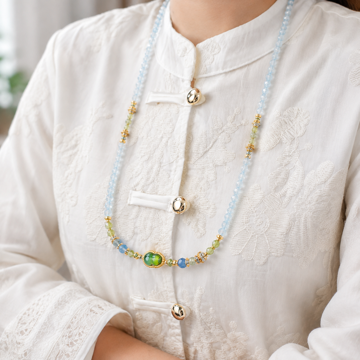 Libra aquamarine convertible necklace worn by a model