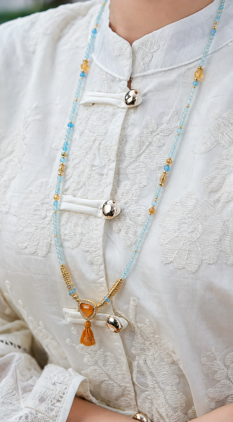Taurus aquamarine convertible necklace worn by a model