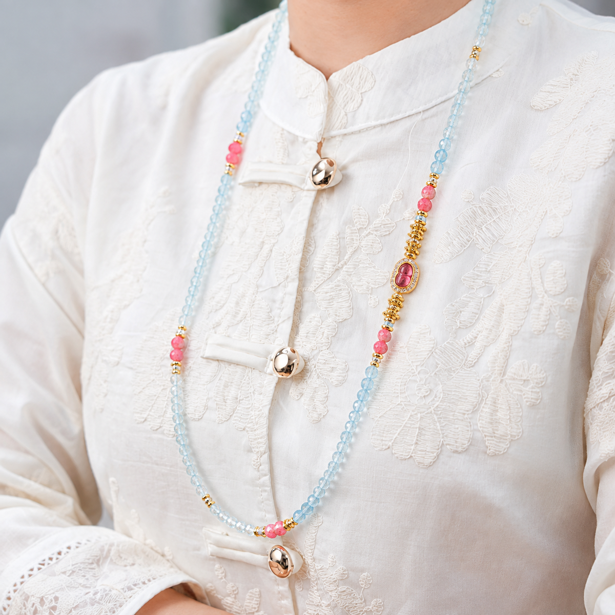Virgo aquamarine convertible necklace worn by a model