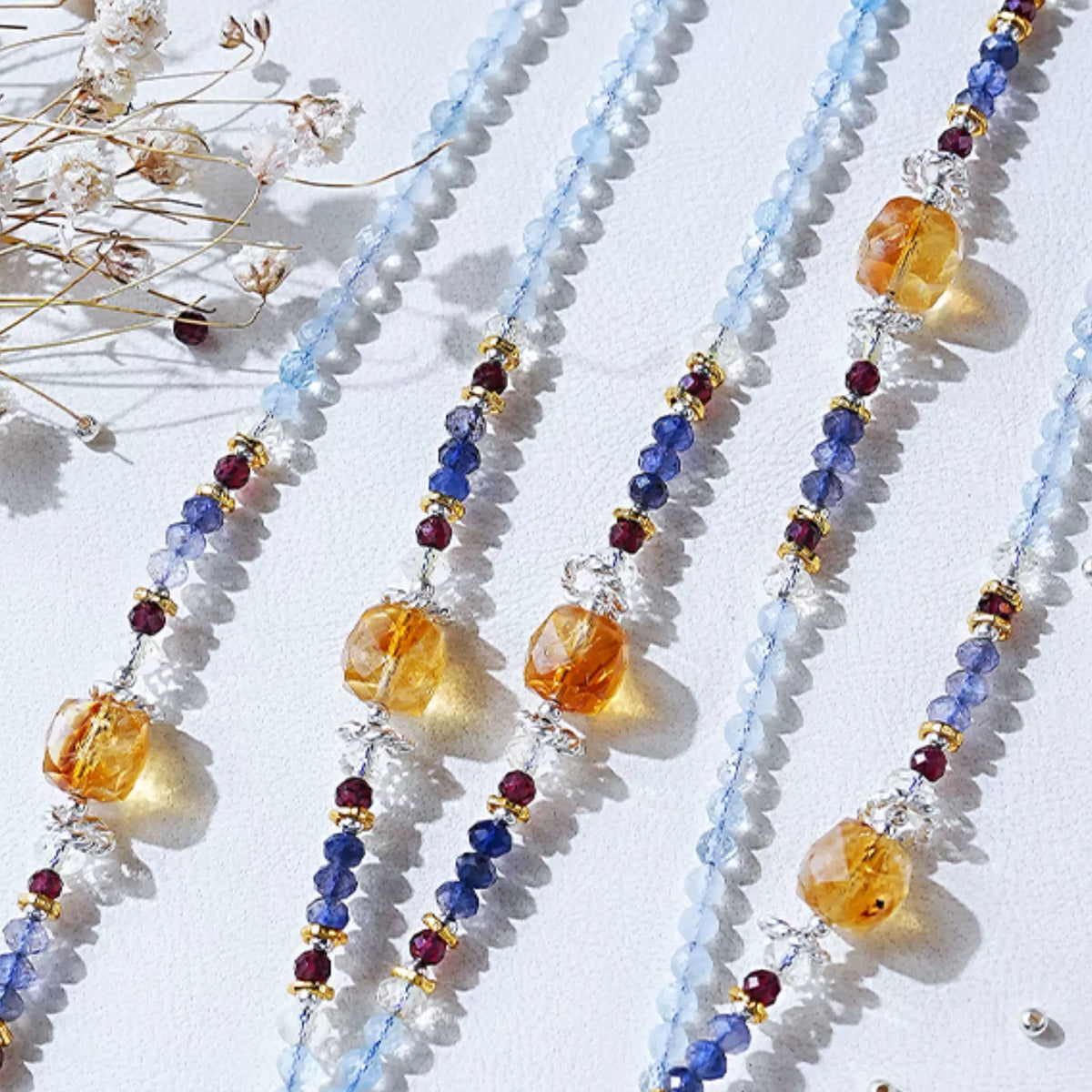Aquamarine necklace with citrine garnet and iolite details