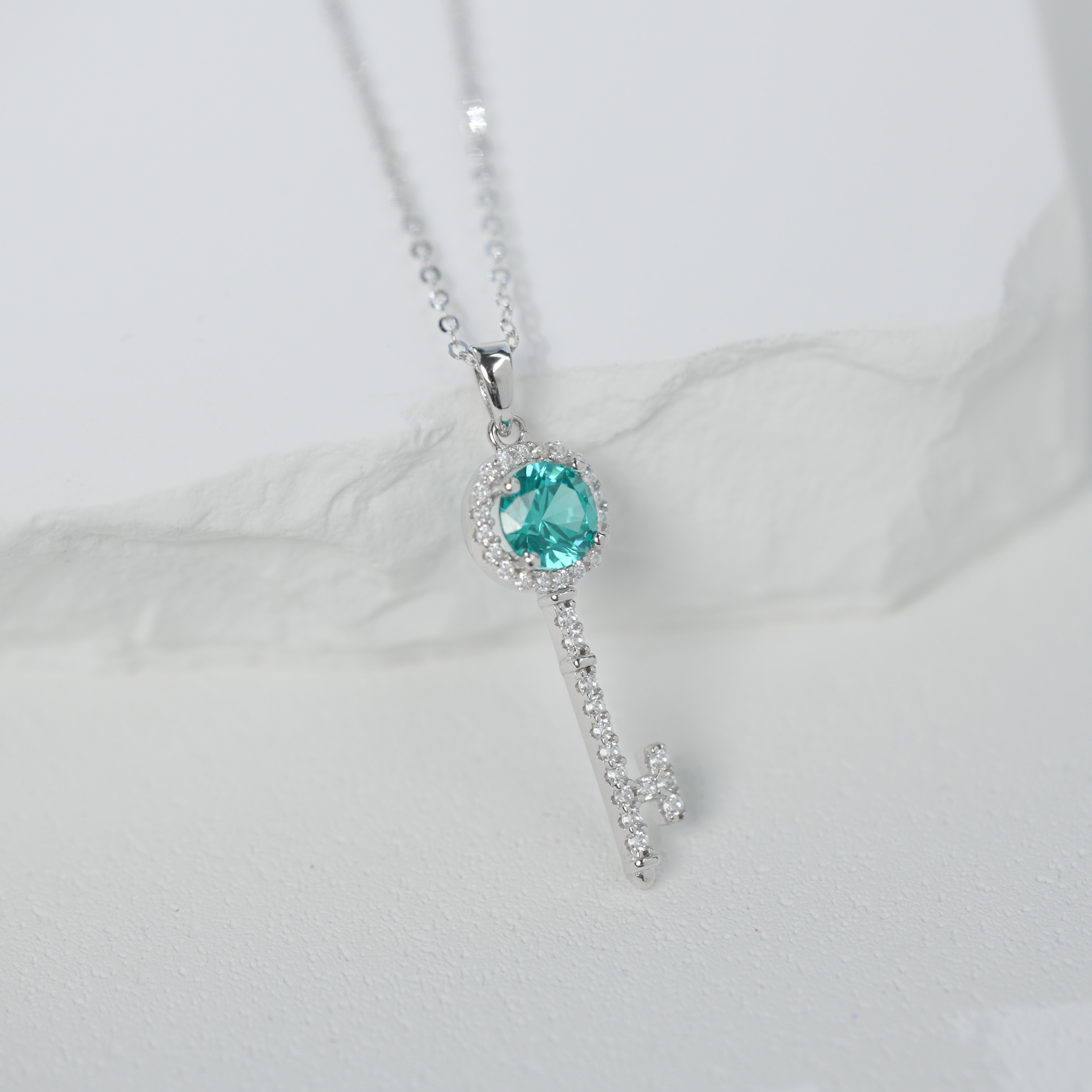 Lab-Grown Paraiba Color YAG Key Pendant Necklace | S925 Sterling Silver Plated 18K Gold, Round Cut with Halo Zircon Accents, Elegant Gemstone Jewelry