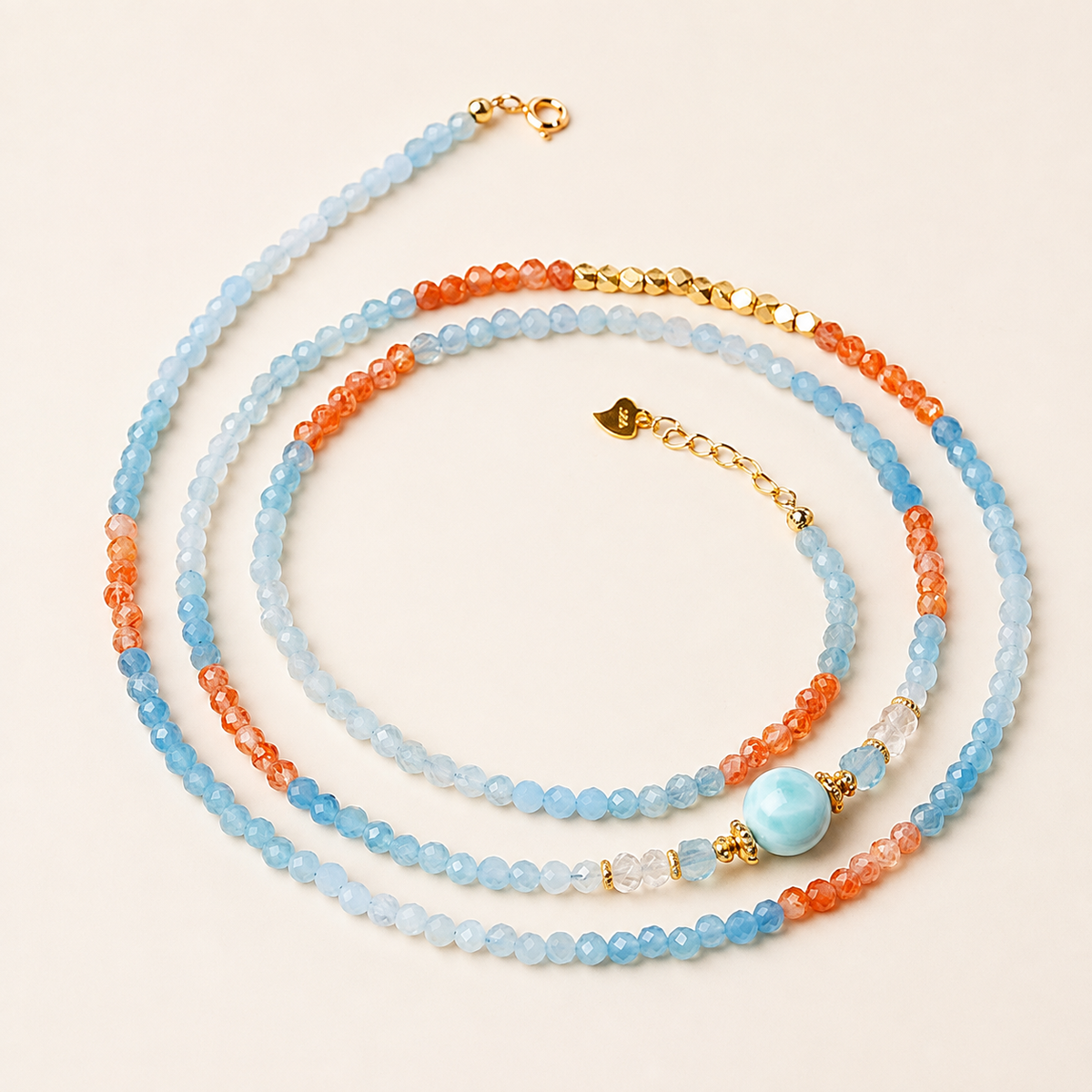 MINROON aquamarine zodiac convertible bracelet necklace on a warm ivory background