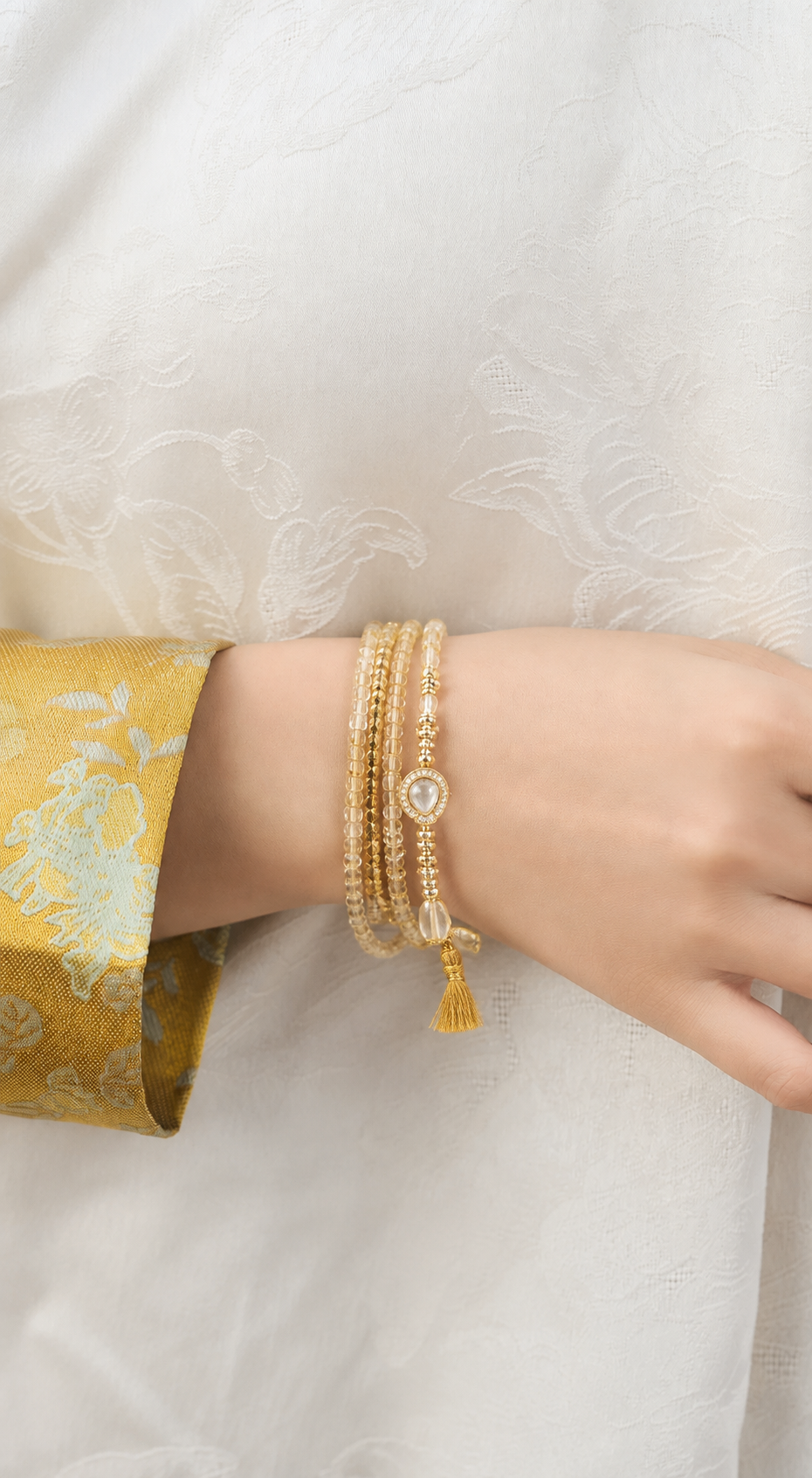 Aries natural citrine and clear quartz bracelet worn on a model wrist