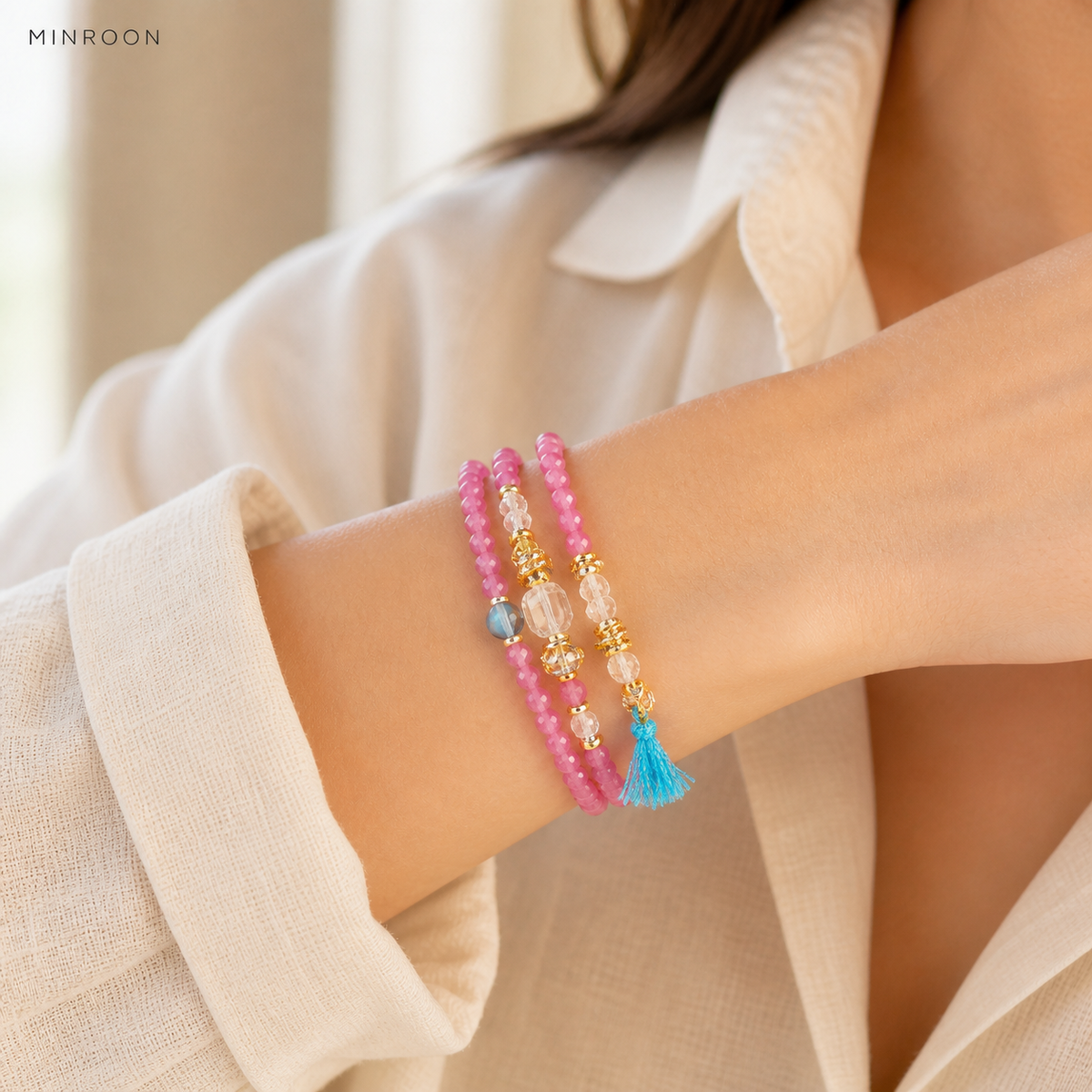 Aries pink tourmaline bracelet worn on wrist