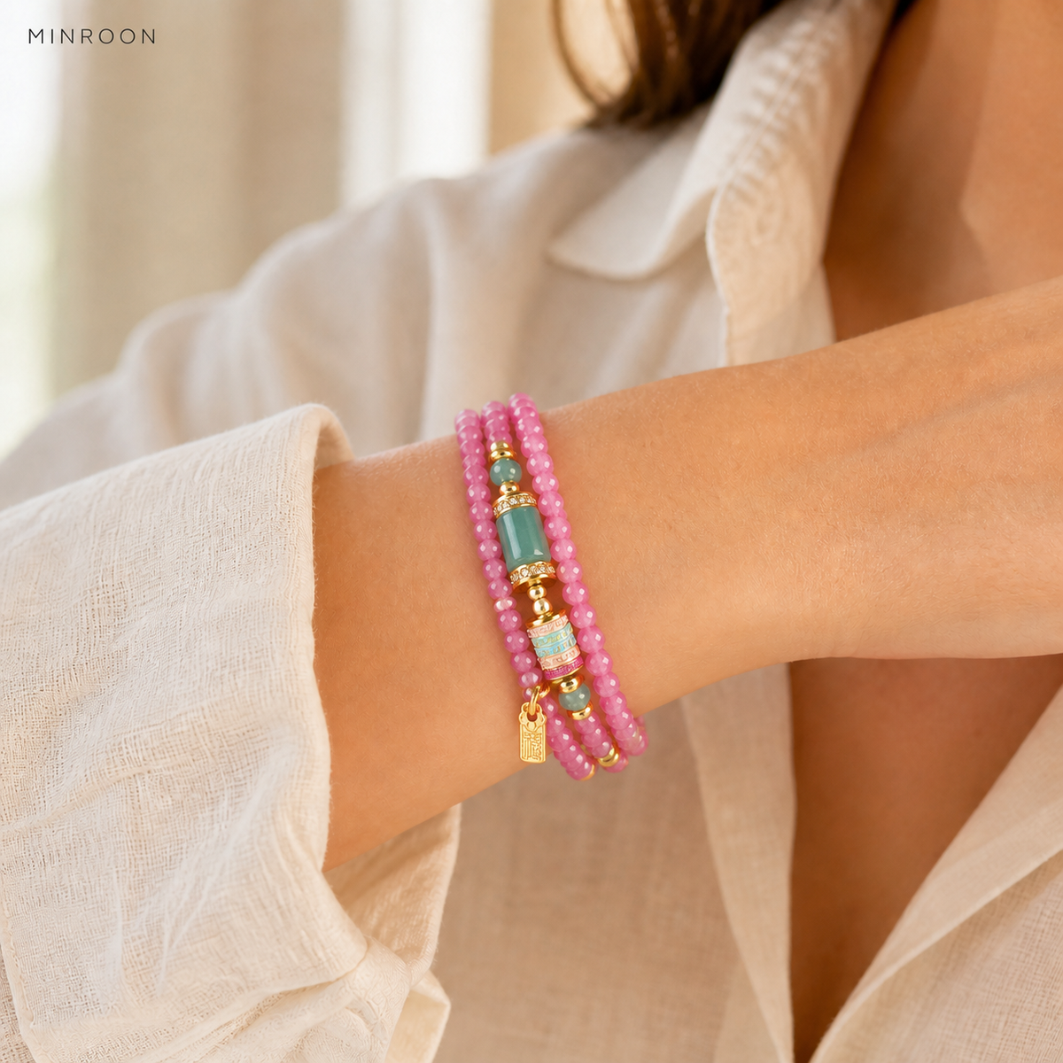 Cancer Pink Tourmaline bracelet worn on wrist