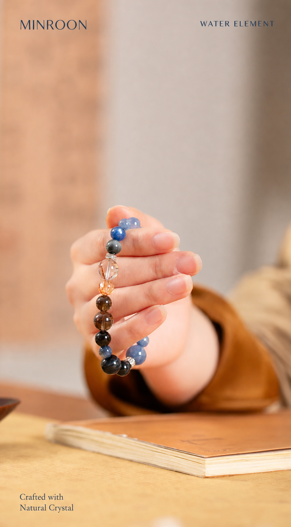 MINROON Water Element natural crystal bracelet held in hand