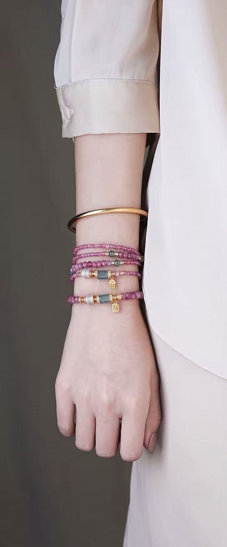 Pink crystal bracelets styled on the wrist